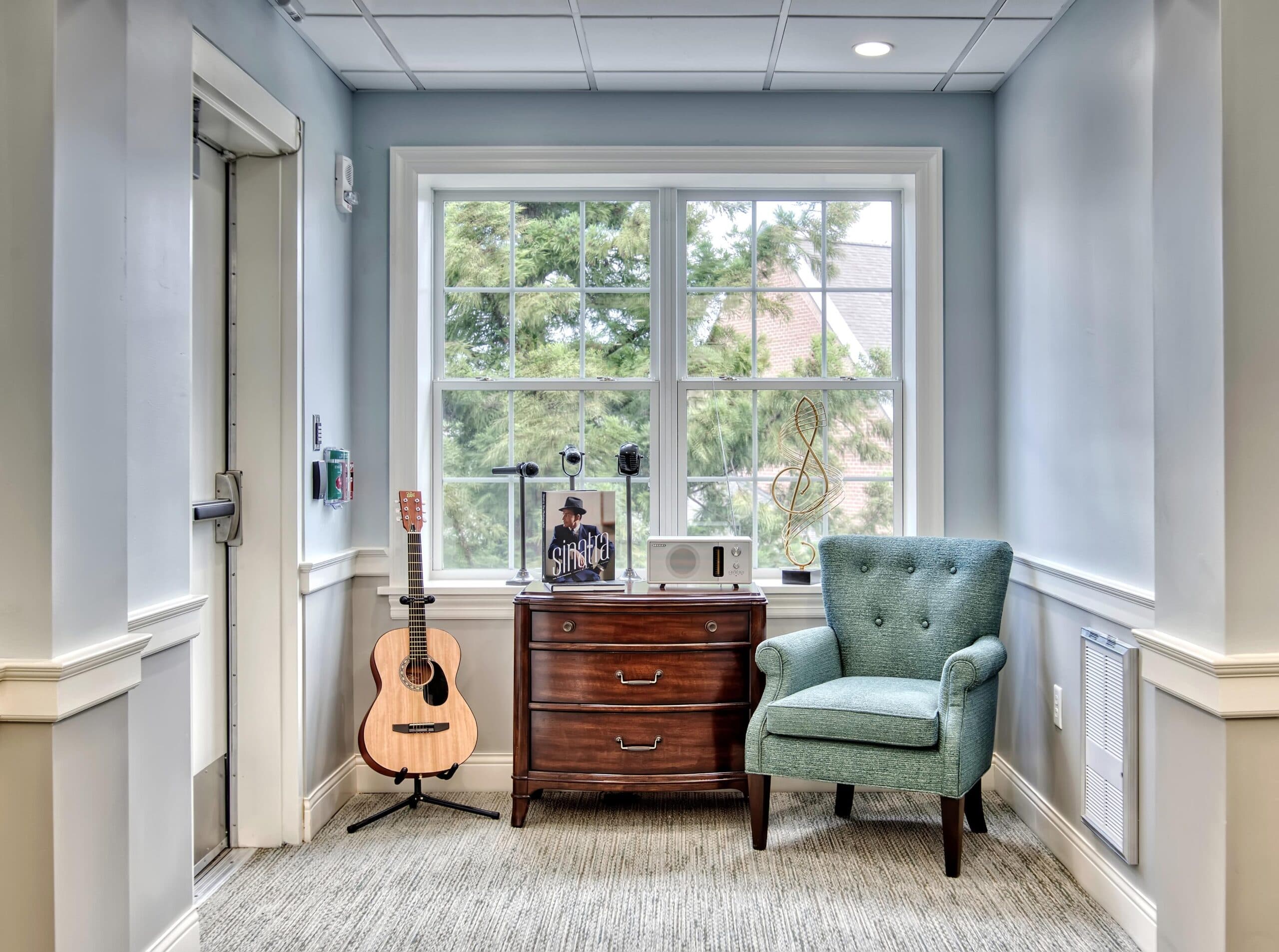 Hallway with chair and guitar