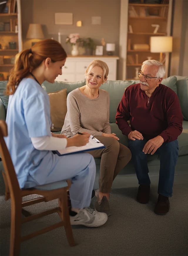 Woman taking notes with residents